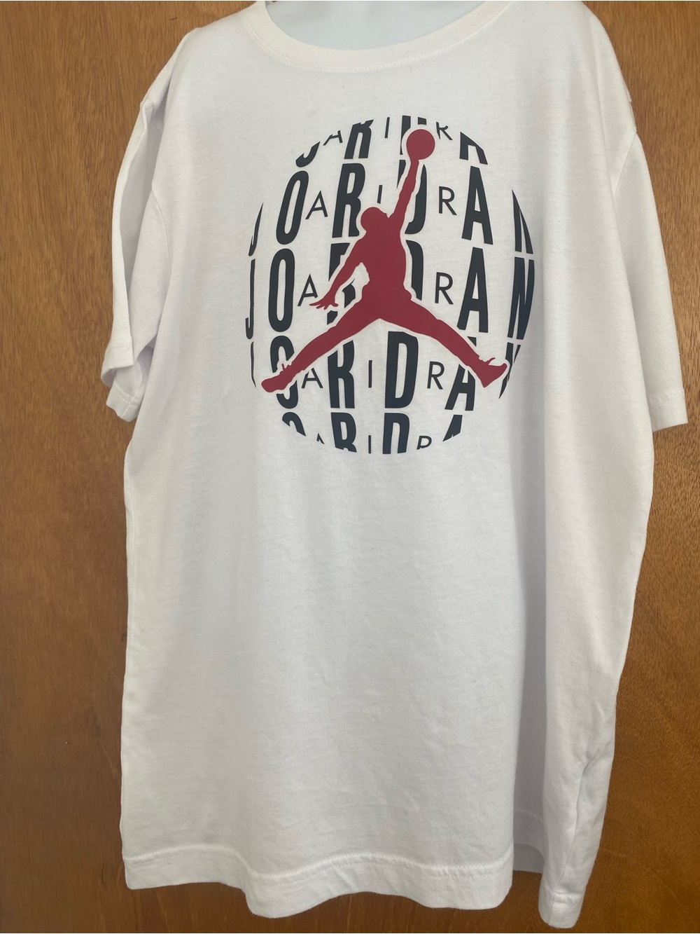 Jordan White Short Sleeve Tee with Red Jumpman and Black Graphic